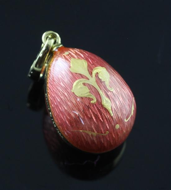 A modern Victor Mayer for Faberge 18ct gold and pink enamel egg pendant, in Faberge box.